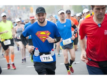 David Benay rocks a superman shirt at the beginning of the marathon during Ottawa Race Weekend Sunday May 25, 2014.