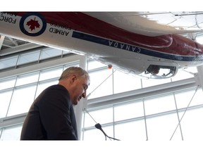 Former cabinet minister David Emerson, who headed an aerospace and space review, holds a news conference to discuss the findings of his report Thursday Nov. 29, 2012 in Ottawa.