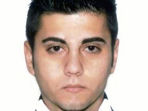 Eriklit Musollari, now 24, is seen in this police mugshot. Musollari is charged with second-degree murder for the shooting death of Peyman Hatami in March 2012.