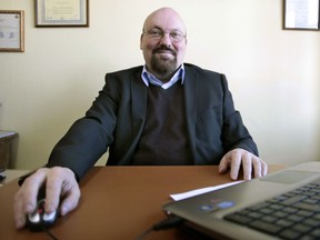 Spanish lawyer Mario Costeja sits at his computer in A Coruna, Galicia, Spain, 13 May 2014. Costeja has been fighting for six years for Google to erase a search result for his name that links to an article on property auctions.