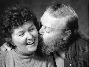 Farley Mowat kisses his wife Claire in an undated handout photo. Canadian author Farley Mowat, a master storyteller and tireless defender of nature and wildlife, has died at age 92.