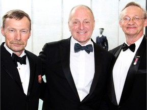 From left, Eric Deslauriers, Ottawa president of the Naval Association of Canada, with U.S. Ambassador Bruce Heyman and Tom DeWolf, at the Battle of the Atlantic Gala Dinner.