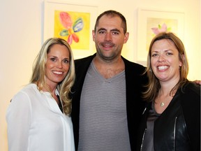 From left, Erin Phillips and Chris Phillips with Erin Loney from Tulips & Maple Catering at the Spring Blooms fundraiser for Candlelighters.