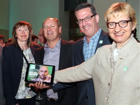 From left, Diane Brunet, Frank Nieuwkoop with Postmedia executives Stephane Le Gal and Lucinda Chodan at the launch party for the new Ottawa Citizen and its digital platforms, held Wednesday, May 21, 2014, at the Canadian Museum of Nature.