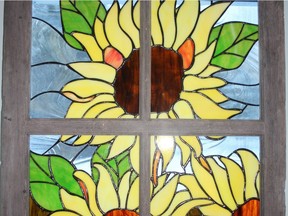 Stained glass sunflowers by Jeanne McTiernan, one of the artists in the Pontiac Artists Studio Tour.