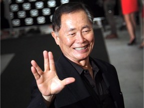 American actor George Takei gesturesl on May 23, 2013 in Singapore for the inaugural Social Star Awards. Former "Star Trek" actor George Takei has reasserted his stance that next year's Winter Olympics should be moved from Sochi to Vancouver due to Russia's "horrific" and "homophobic" anti-gay laws.