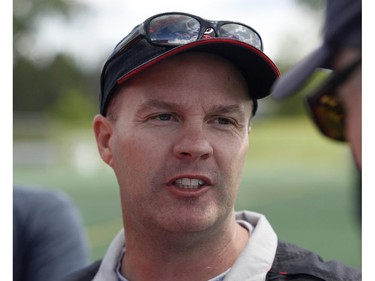 Head coach Rick Campbell speaks to reporters at the CFL Ottawa Redblacks rookie camp at Keith Harris Stadium in Ottawa on Friday May 30, 2014.