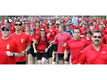 It was a sea of red on Colonel By Drive Friday at 1 p.m. as runners and walkers of all age and ability from the Canadian Armed Forces, DND and other non-government groups participated in the Canadian Forces Day Walk/Run in Red 2014.  It is the eighth year of the event, which included an eight-kilometre run and three-kilometre walk to show support for Canadian Forces.