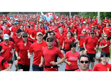 It was a sea of red on Colonel By Drive Friday at 1 p.m. as runners and walkers of all age and ability from the Canadian Armed Forces, DND and other non-government groups participated in the Canadian Forces Day Walk/Run in Red 2014.  It is the eighth year of the event, which included an eight-kilometre run and three-kilometre walk to show support for Canadian Forces.