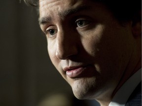 Liberal Leader Justin Trudeau speaks with the media following caucus Wednesday May 14, 2014 in Ottawa.