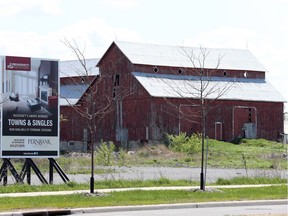 The red barn at 590 Hazeldean Road , built in 1873, was part of the prosperous Bradley/Craig dairy operation.  Richcraft wants to dismantle the barn and have it reassembled at Saunders Farm near Munster.