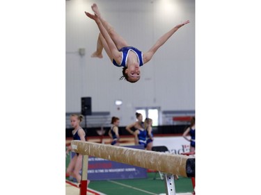 Kristina Undheim (Alberta) does a backwards aerial during her practice routine.