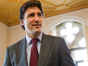 Liberal Leader Justin Trudeau is interviewed on Parliament Hill by reporter Mark Kennedy. Photo taken on May 15, 2014.