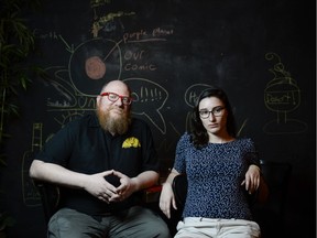 Local slam poets Rusty Priske (L) and Sarah Ruszala is photographed at Shanghai Retaurant on Thursday, May 15, 2014.