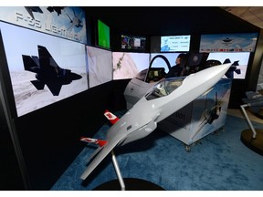 Lockheed Martin displays an F-35 simulator at the CANSEC trade show in Ottawa on Wednesday, May 28, 2014.