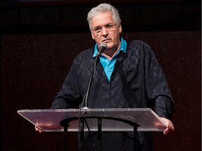 Maestro Pinchas Zukerman addresses the gathering during the launch of Canada���s National Arts Centre Orchestra tour to the United Kingdom in commemoration of the 100th anniversary of the WW1. Photo taken at 11:39 am on April 1, 2014.