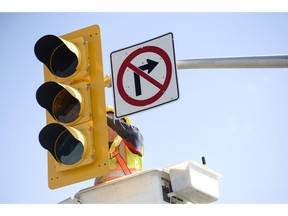 Maintenance work for the traffic signal by the VIA rail crossing on Fallowfield rd. is being done on Saturday, May 10, 2014. James Park/Ottawa Citizen