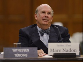 Justice Marc Nadon appears before a parliamentary committee on Parliament Hill in Ottawa, Wednesday, Oct.2, 2013.