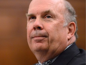 Justice Marc Nadon arrives to appear before a parliamentary committee on Parliament Hill in Ottawa on Wednesday, October 2, 2013, regarding his nomination of Supreme Court of Canada Justice.