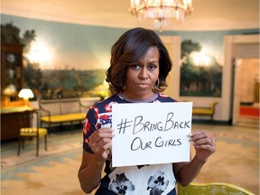 Michelle Obama's twitter feed showed this photo of the First Lady joining a hashtag campaign.