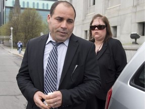 Mohamed Harkat and his wife, Sophie Lamarche Harkat, leave the Supreme Court of Canada on Wednesday May 14, 2014.