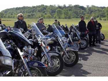 Motorcyclists wait at the start of the Ottawa TELUS Motorcycle Ride for Dad at the Canadian Aviation and Space Museum on Saturday May 31, 2014.