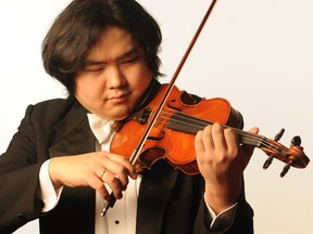 NACO's concertmaster Yosuke Kawasaki was a featured performer Wednesday night.  
Fred Cattroll photo.