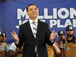 Ontario Progressive Conservative Leader Tim Hudak speaks to media at the Pre-Apprenticeship Training Institute in Toronto Thursday, May 29, 2014.