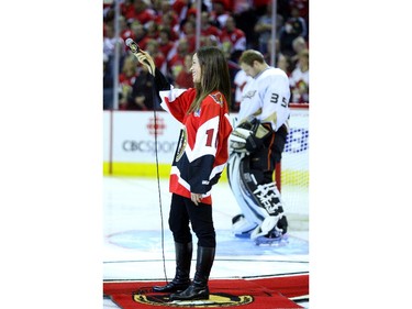 Alanis Morissette sings the national anthems prior to the game opposing the Ottawa Senators and the Anaheim Ducks in the fourth game of the Stanley Cup Final held in Ottawa at Scotiabank Place, Monday, June 04, 2007.