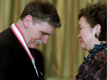 Governor General Adrienne Clarkson presents--Lt Gen (Retired) Romeo Dallaire with the Order of Canada.