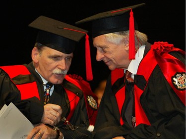 Ottawa U convocation ceremony. Left is Romeo Dallaire chating with Jacques Godbout after receiving their University doctorate.