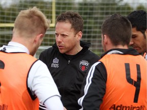 Ottawa Fury FC Head Coach Marc Dos Santos speaks with his team during a recent practice.