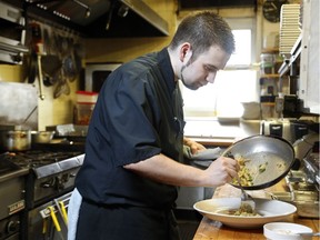 Zen Kitchen's Executive Chef Kyle Mortimer-Proulx, prepares house-made Cavatelli pasta with tofu ricotta, sweet peas, mint, mushrooms and preserved lemon at the Somerset Street restaurant.