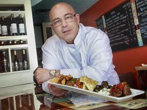 Zizis Kitchen& Wine Bar chef Ferdi Ozkul with mezze plate.