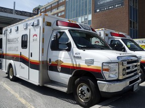 Paramedics treated a 70-year-old woman after a car crashed into a Pizza Hut Tuesday evening, located at Greenbank Road near Strandherd Drive.