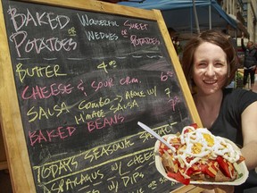 Jasmine Leese at the Hot Potato Company says the Sparks Street BIA has told market vendors to stop selling hot foods, because local businesses complained it was taking away their customers. ( Chris Mikula / Ottawa Citizen)