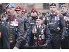 Veterans parade at Remembrance Day ceremonies at the National War Memorial in Ottawa.