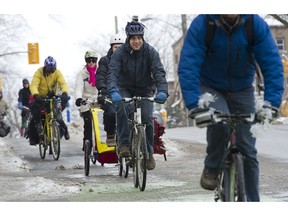 The Citizens for Safe Cycling hold a bike parade along Laurier Avenue on Sunday, January 22, 2012 to encourage more winter cycling when possible.