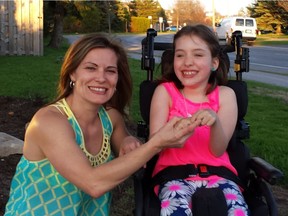 Evelyn Lush with her daughter, eight-year-old Lauren King, who has cerebral palsy.