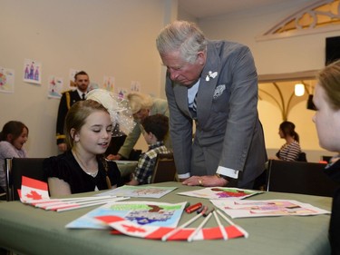 Prince Charles meets with local children at Cornwall United Church on Tuesday, May 20, 2014 in Cornwall, P.E.I. The Royal couple are on a four-day tour of Canada.