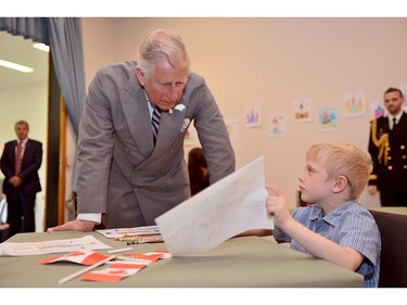 Prince Charles meets with local children at Cornwall United Church on Tuesday, May 20, 2014 in Cornwall, P.E.I. The Royal couple are on a four-day tour of Canada.