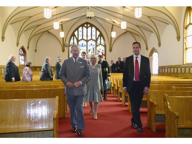 Prince Charles, left, his wife Camilla and P.E.I Premier Robert Ghiz leave Cornwall United Church after listening to a musical presentation by a combined choir from local churches on Tuesday, May 20, 2014 in Cornwall, P.E.I. The Royal couple are on a four-day tour of Canada.