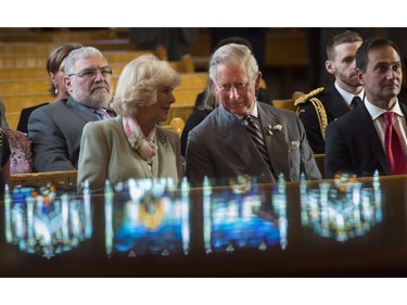 Prince Charles and his wife Camilla listen to a musical presentation by a combined choir from local churches on Tuesday, May 20, 2014 in Cornwall, P.E.I. The Royal couple are on a four-day tour of Canada.