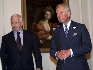 Prince Charles arrives with Governor General David Johnston to be sworn in as a member of the Privy Council in Halifax on Sunday, May 18, 2014. The Royal couple begin a four-day tour of Canada.