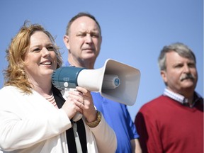 Progressive Conservative MPP representing Nepean-Carleton, Lisa MacLeod speaks to the crowd at the protest where147 Trucks and many supporters gathered at the Canadian Tire Centre parking lot to protest against the city on Saturday, May 10, 2014.  James Park/Ottawa Citizen   #116977