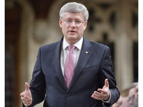 Prime Minister Stephen Harper responds during Question Period in the House of Commons on Parliament Hill in Ottawa, Wednesday May 7, 2014 .