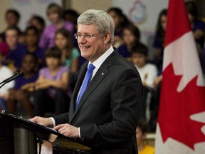Prime Minister Stephen Harper announces an additional $3.5 billion over five years towards the prime minister's maternal, newborn and child health initiative at Davisville Pulbic School in Toronto on Thursday, May 29, 2014.
