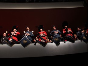 The Governor General's Foot Guards and Central Band of the Canadian Armed Forces prepare to command attention with their trumpet fanfare at the Governor General's Performing Arts Awards Gala held at the National Arts Centre on Saturday, May 10, 2014.