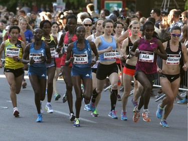 The top women runners start the 10k race during the Ottawa Race Weekend on Saturday May 24, 2014. (Patrick Doyle / Ottawa Citizen)  ORG XMIT: 0526 ottawa10k18