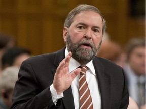 NDP leader Tom Mulcair rises during Question Period in the House of Commons Tuesday May 27, 2014 in Ottawa.